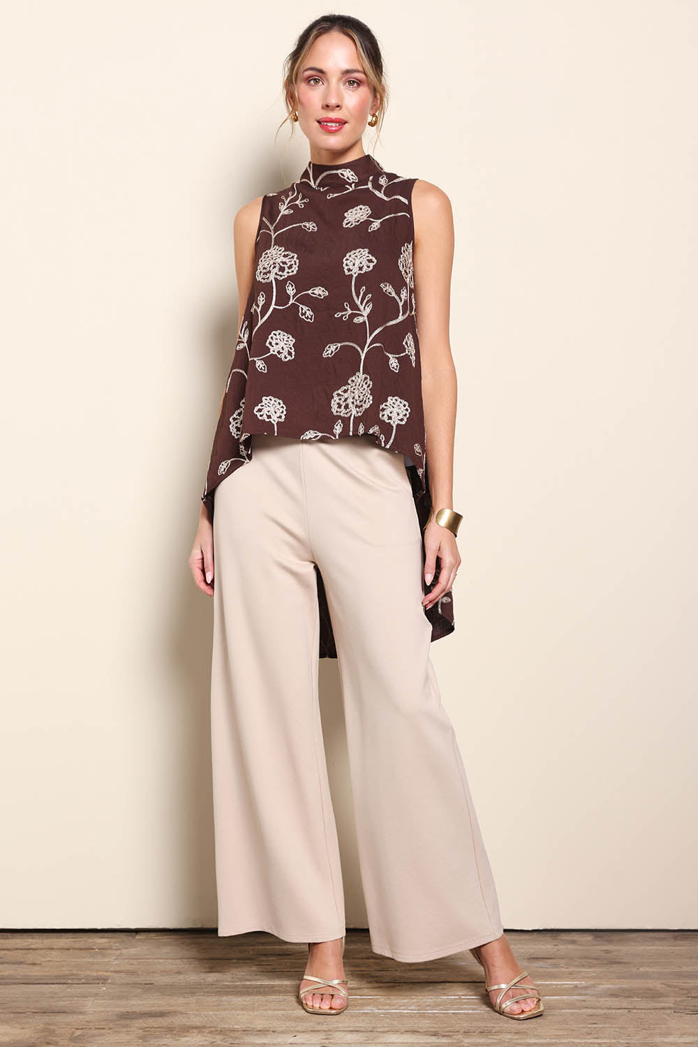 Model Maddiec wearing size 10 of the Celia Top - Chocolategold in colour Chocolategold, from the front