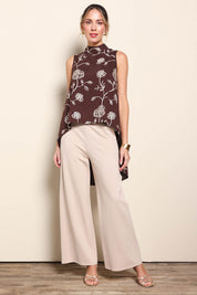 Model Maddiec wearing size 10 of the Celia Top - Chocolategold in colour Chocolategold, from the front