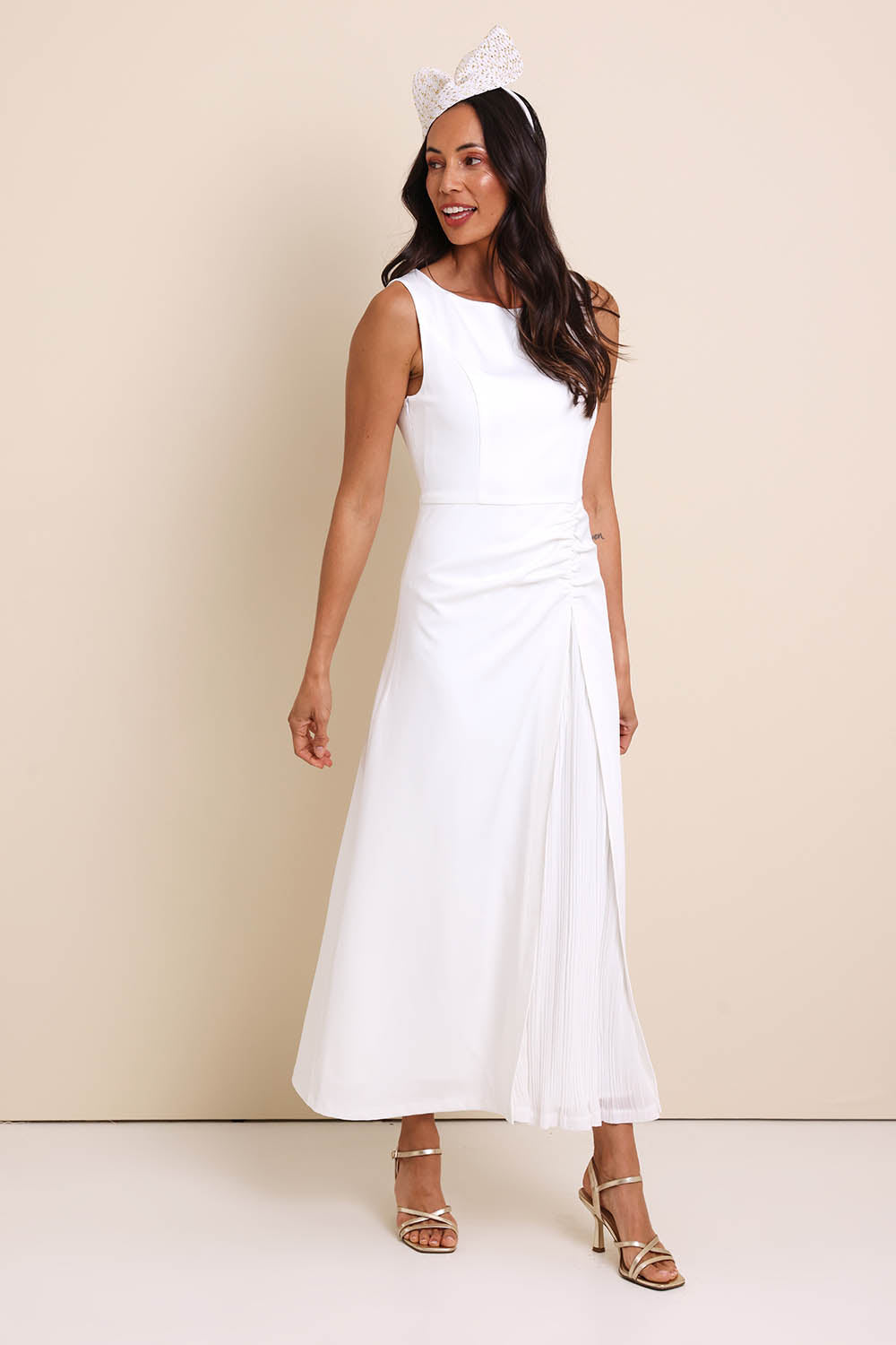 Model Amandam wearing size 10 of the Lisa Evening Gown - Snow in colour Snow, from the front