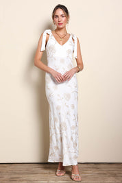 Model Maddiec wearing size 10 of the Tara Slip Dress - Whitegold in colour Whitegold, from the front