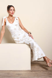 Model Maddiec wearing size 10 of the Tara Slip Dress - Whitegold in colour Whitegold, from the front