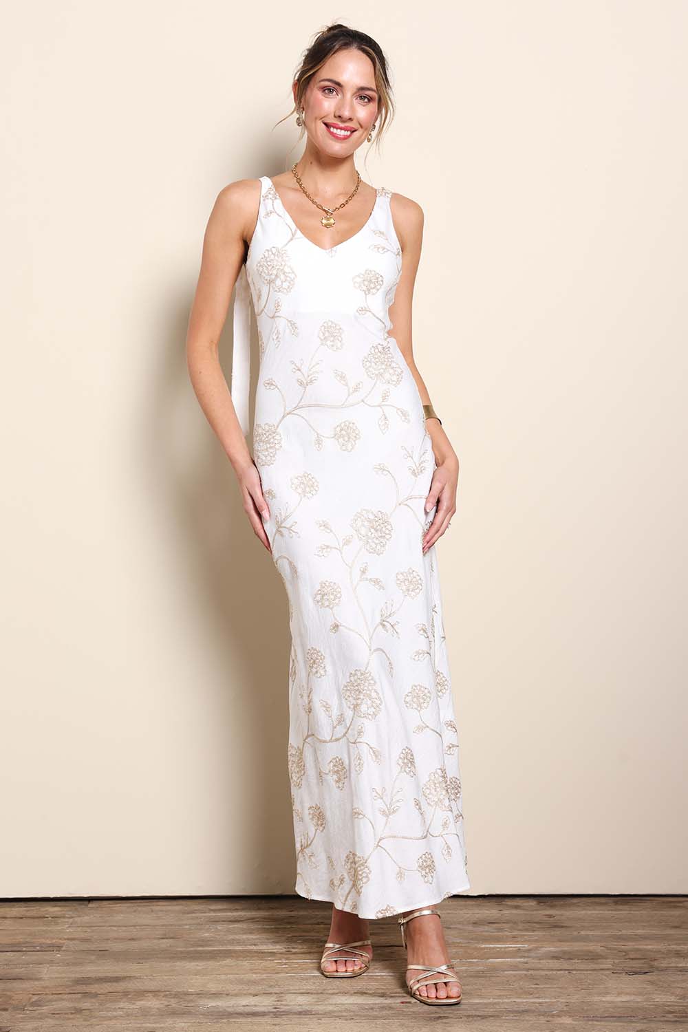 Model Maddiec wearing size 10 of the Tara Slip Dress - Whitegold in colour Whitegold, from the front