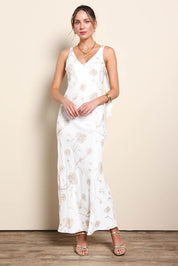 Model Maddiec wearing size 10 of the Tara Slip Dress - Whitegold in colour Whitegold, from the front