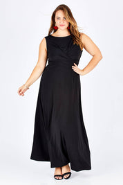 Model Sophie wearing size 14 of the Alexa Dress in colour Black (Black), from the front, showing the whole outfit
