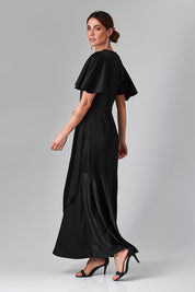 Model Monique wearing size 8 of the Fleur Dress in colour Black (Black), from the front, showing the whole outfit