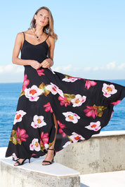 Model Jira wearing size 8 of the Hannah Skirt in colour Goddess (Black), from the front, showing the whole outfit