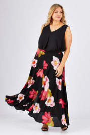 Model Ljubenka wearing size 18 of the Hannah Skirt in colour Goddess (Black), from the front, showing the whole outfit