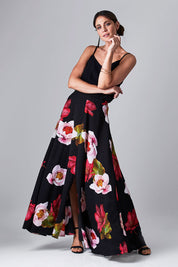 Model Monique wearing size 8 of the Hannah Skirt in colour Goddess (Black), from the front, showing the whole outfit