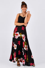 Model Monique wearing size 8 of the Hannah Skirt in colour Goddess (Black), from the front, showing the whole outfit