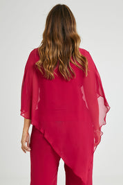 Model Laura wearing size 14 of the Marie Top in colour Granita (Pink), from the back