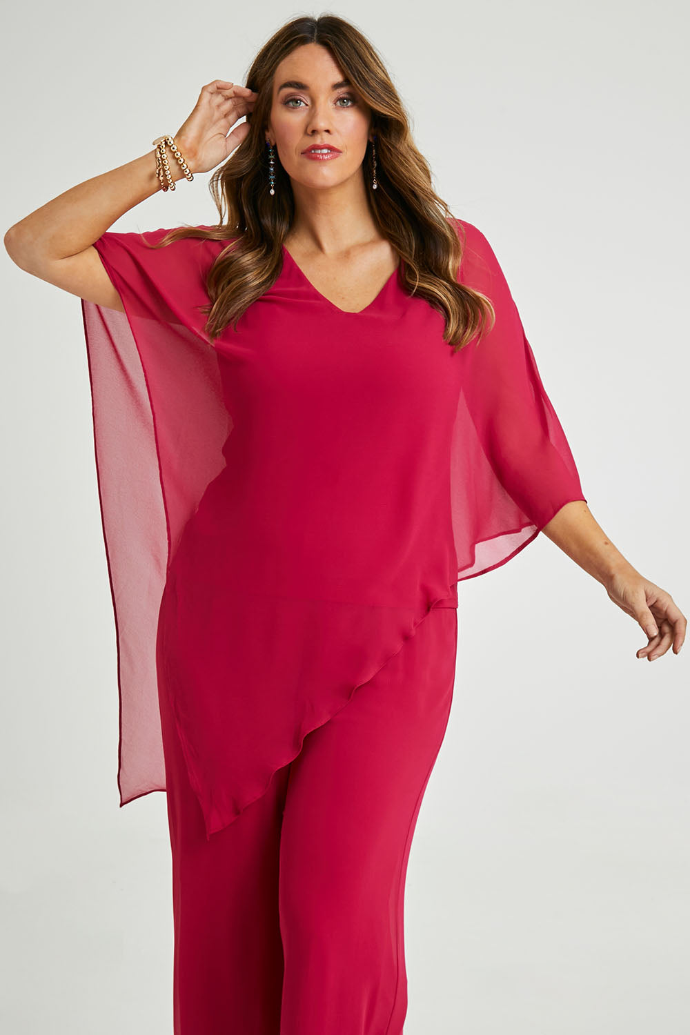 Model Laura wearing size 14 of the Marie Top in colour Granita (Pink), from the front, cropped image