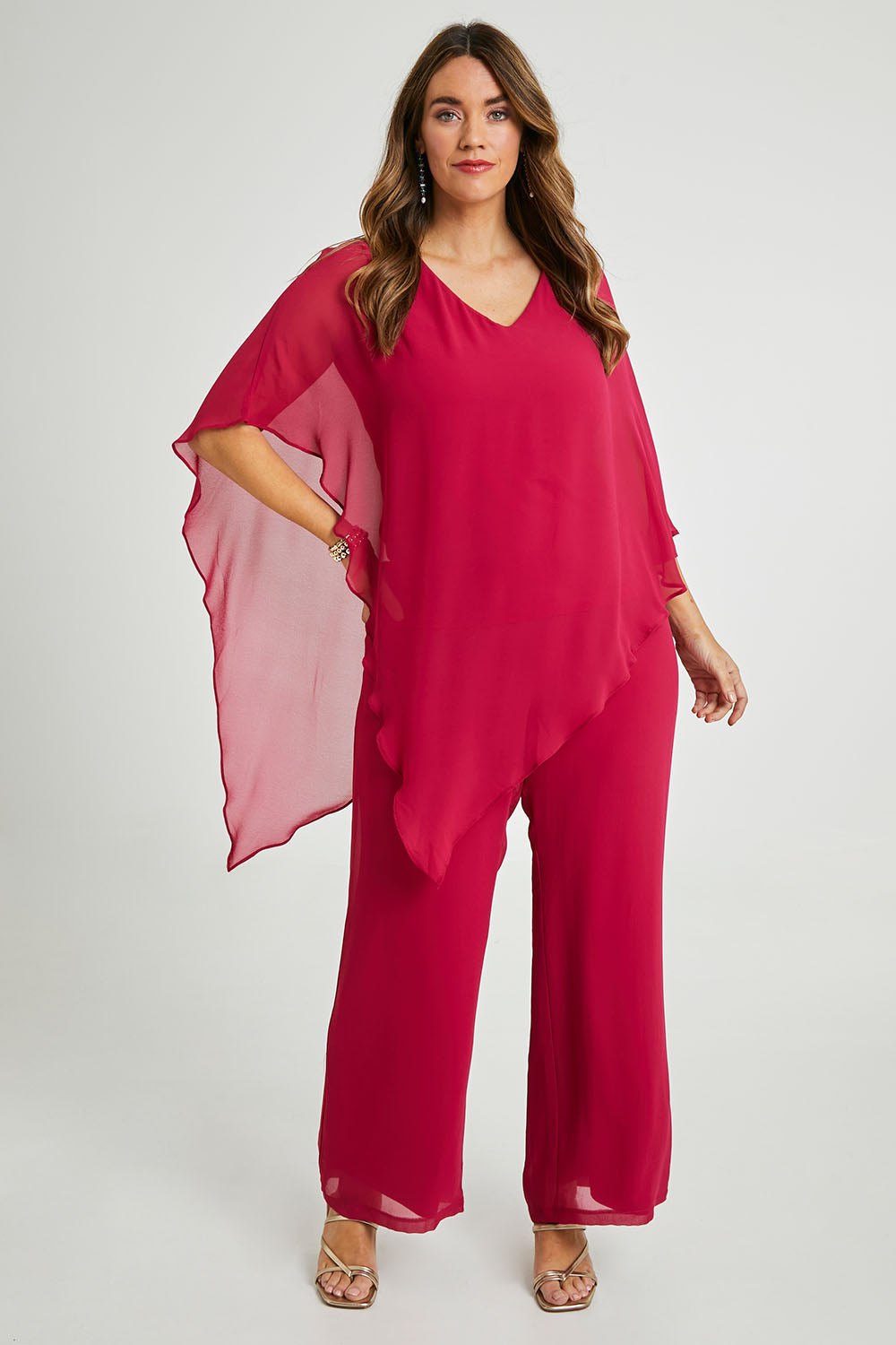 Model Laura wearing size 14 of the Marie Top in colour Granita (Pink), from the front, showing the whole outfit