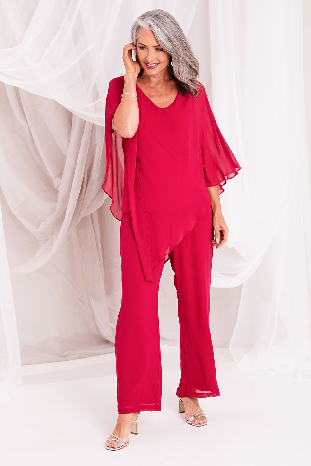 Model Luisa wearing size 10 of the Marie Top in colour Granita (Pink), from the front, showing the whole outfit
