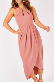 Model Laura wearing size 12 of the Adriana Dress in colour Camelia (Pink), from the front, cropped image