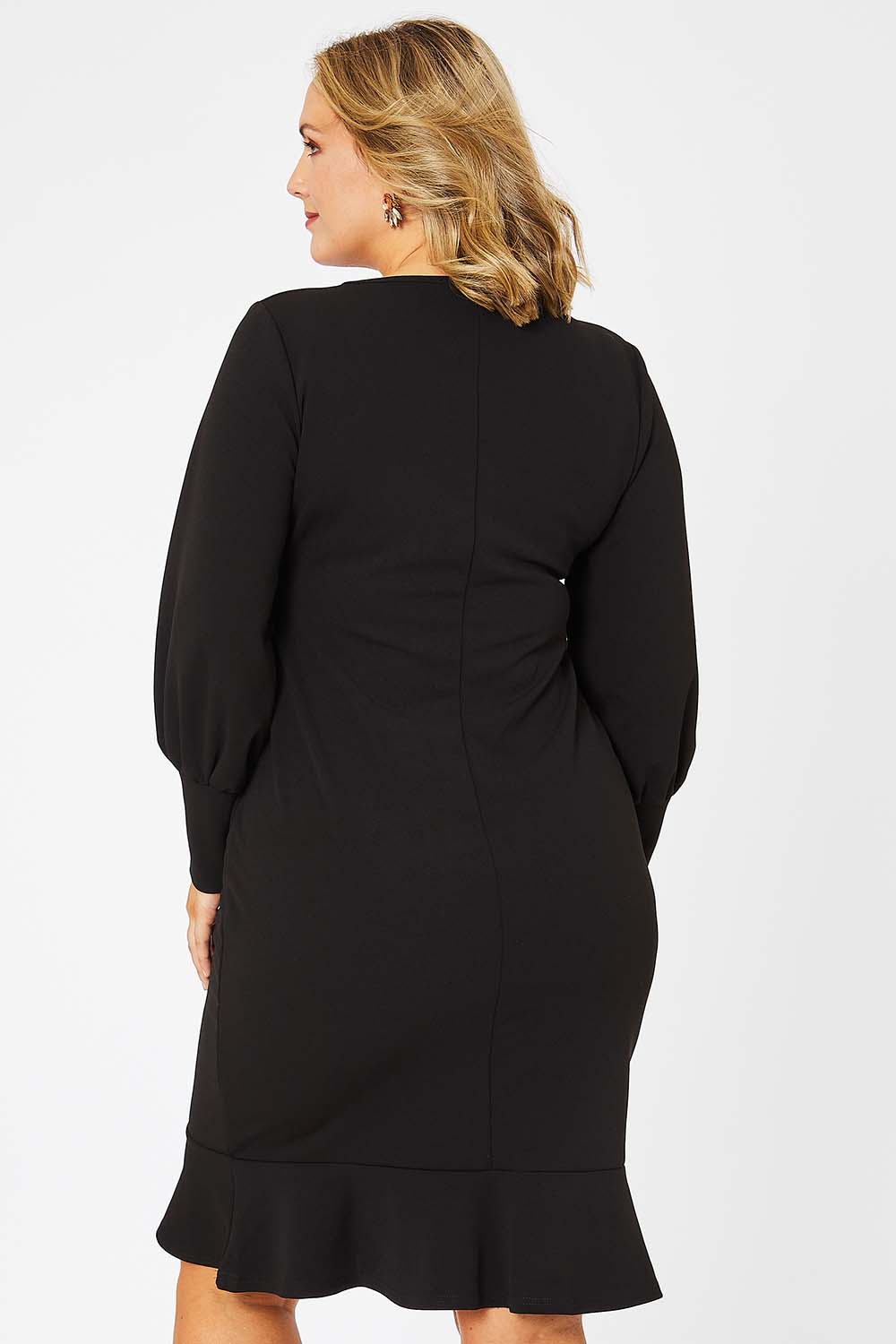 Model Jess wearing size 14 of the Sophie Dress in colour Black (Black), from the back