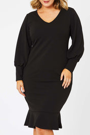Model Jess wearing size 14 of the Sophie Dress in colour Black (Black), from the front, cropped image