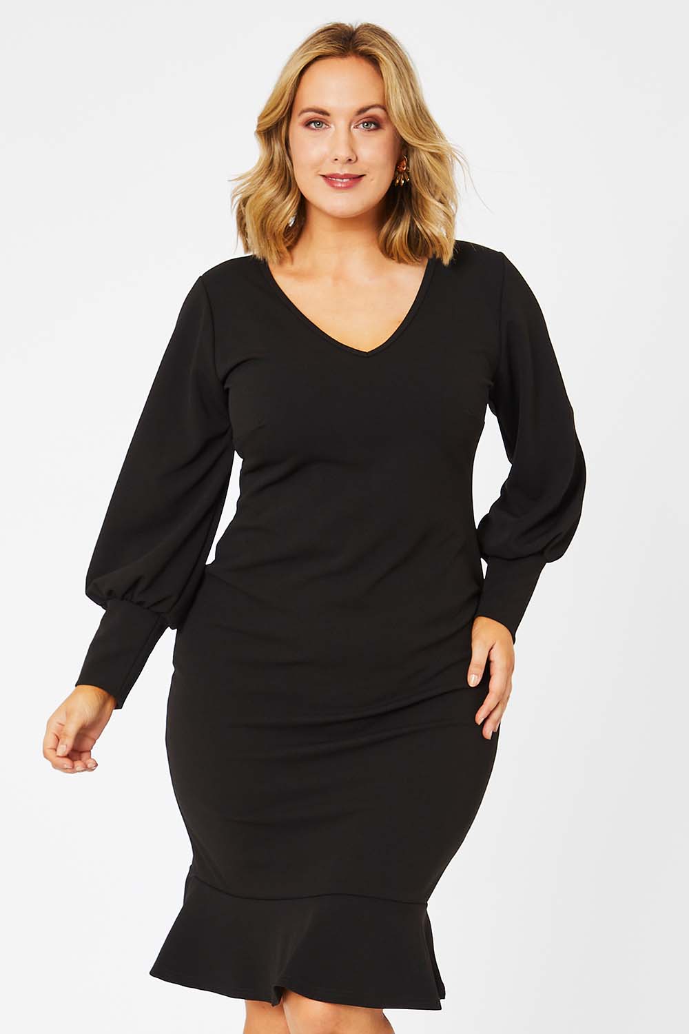 Model Jess wearing size 14 of the Sophie Dress in colour Black (Black), from the front, cropped image