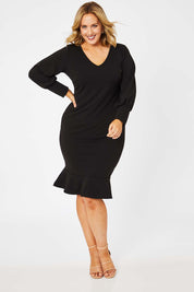 Model Jess wearing size 14 of the Sophie Dress in colour Black (Black), from the front, showing the whole outfit