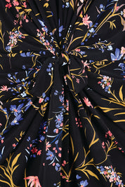 Product shot of the The Printed Nancy Dress – Floral in colour Floral, showing detail