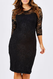Model Laura wearing size 12 of the Michelle in colour Black (Black), from the front, cropped image