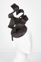 A model wearing size OneSize of the Nalah Fascinator in colour Black (Black), from the front, showing the whole outfit