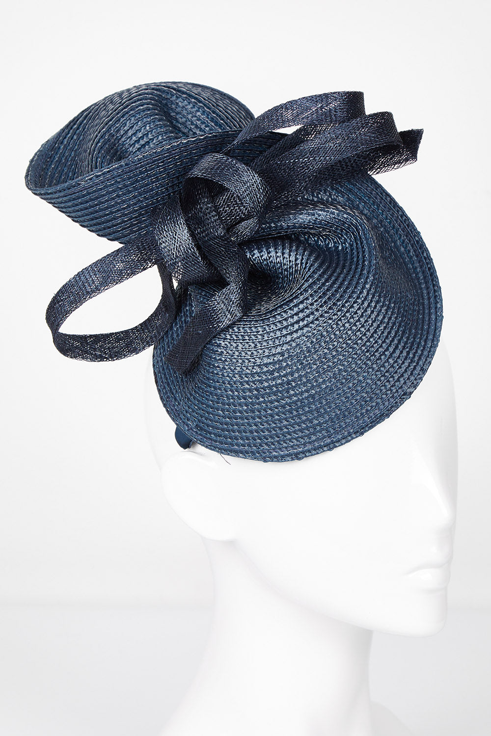 A model wearing size OneSize of the Drew Fascinator in colour Navy (Blue), from the front, showing the whole outfit
