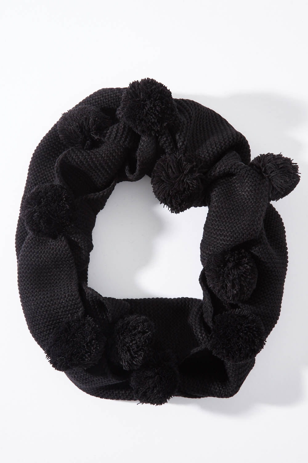 A model wearing size OneSize of the Pom Pom Snood Scarf in colour Black (Black), from the front, showing the whole outfit