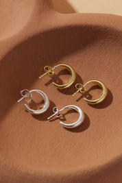 A model wearing the La Muse Silver Stud Hoop Earring in colour Silver (Metallics), from the front, showing the whole outfit