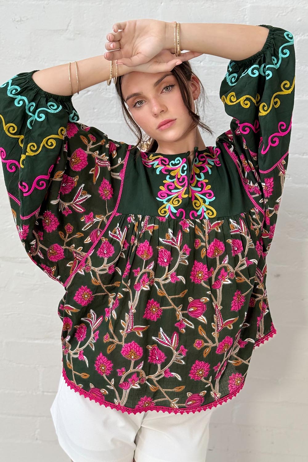 A model wearing the Bahamas Cotton Blend Top in colour Dreamy (Green), from the front, showing the whole outfit