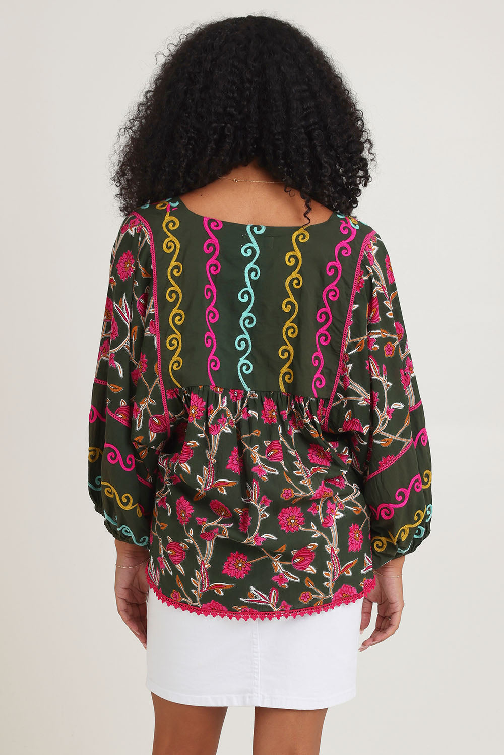 Model Ziara wearing size S of the Bahamas Cotton Blend Top in colour Dreamy (Green), from the back