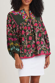 Model Ziara wearing size S of the Bahamas Cotton Blend Top in colour Dreamy (Green), from the front, cropped image