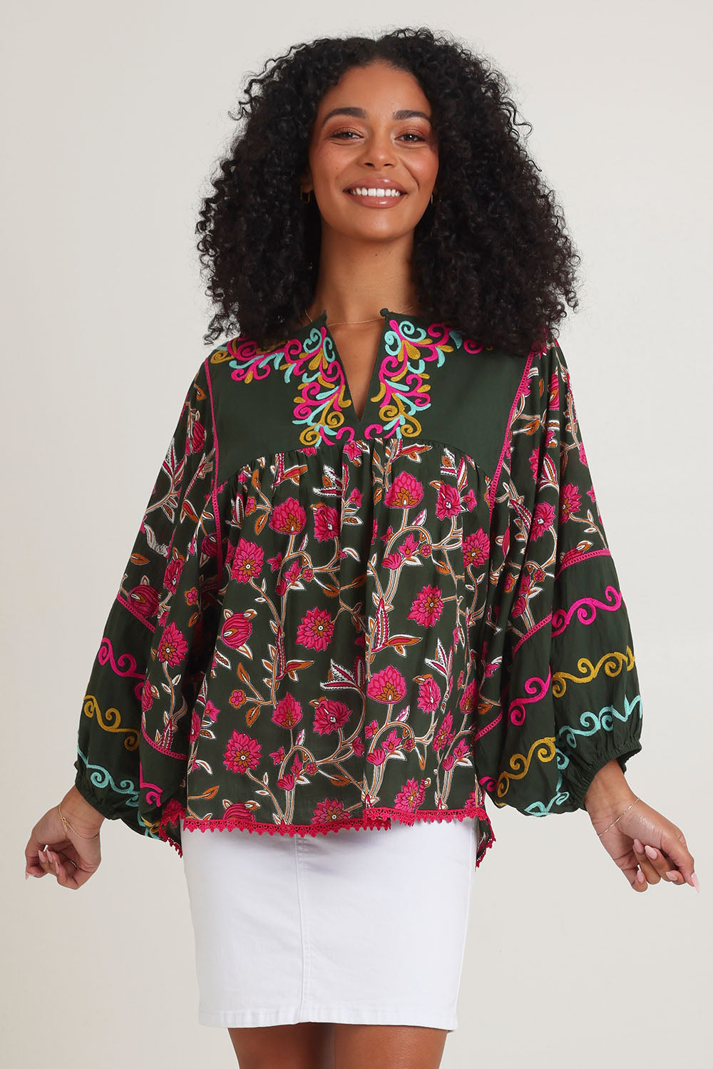 Model Ziara wearing size S of the Bahamas Cotton Blend Top in colour Dreamy (Green), from the front, cropped image