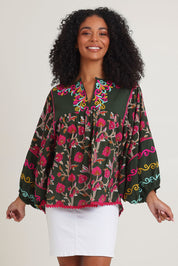 Model Ziara wearing size S of the Bahamas Cotton Blend Top in colour Dreamy (Green), from the front, cropped image