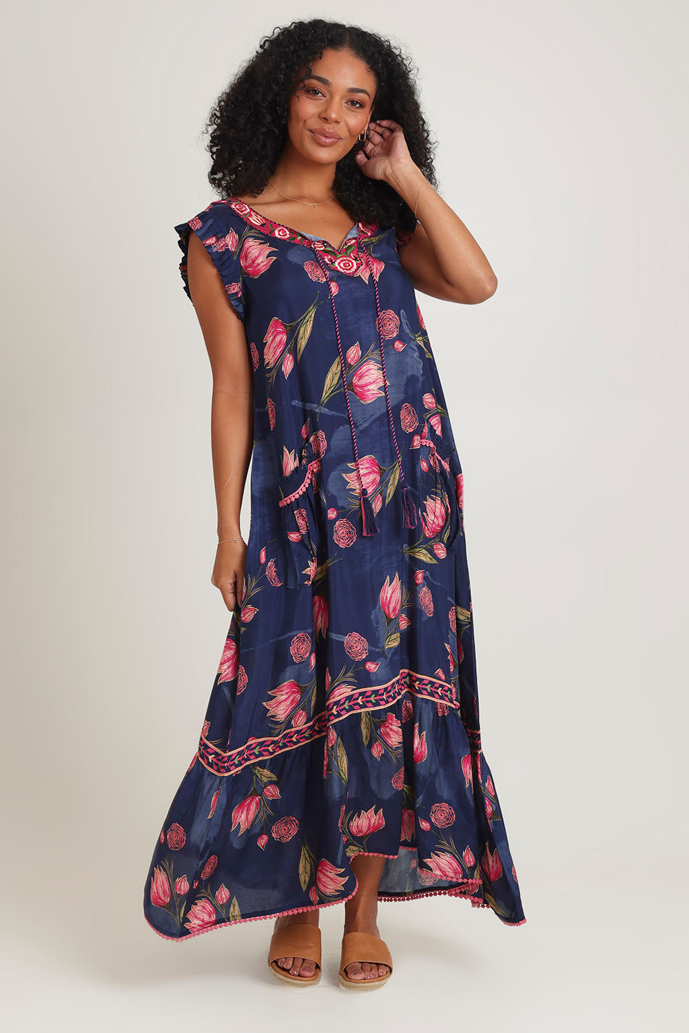 Model Ziara wearing size S of the Epson Maxi Dress in colour Frolic (Blue), from the front, showing the whole outfit
