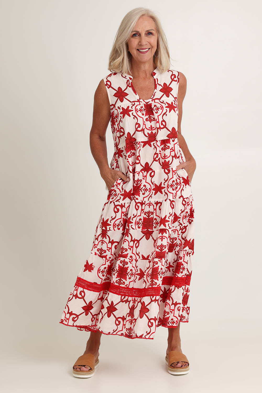 Model Sandy wearing size S of the Lulu Cotton Maxi Dress in colour Jemmared (Red), from the front, showing the whole outfit