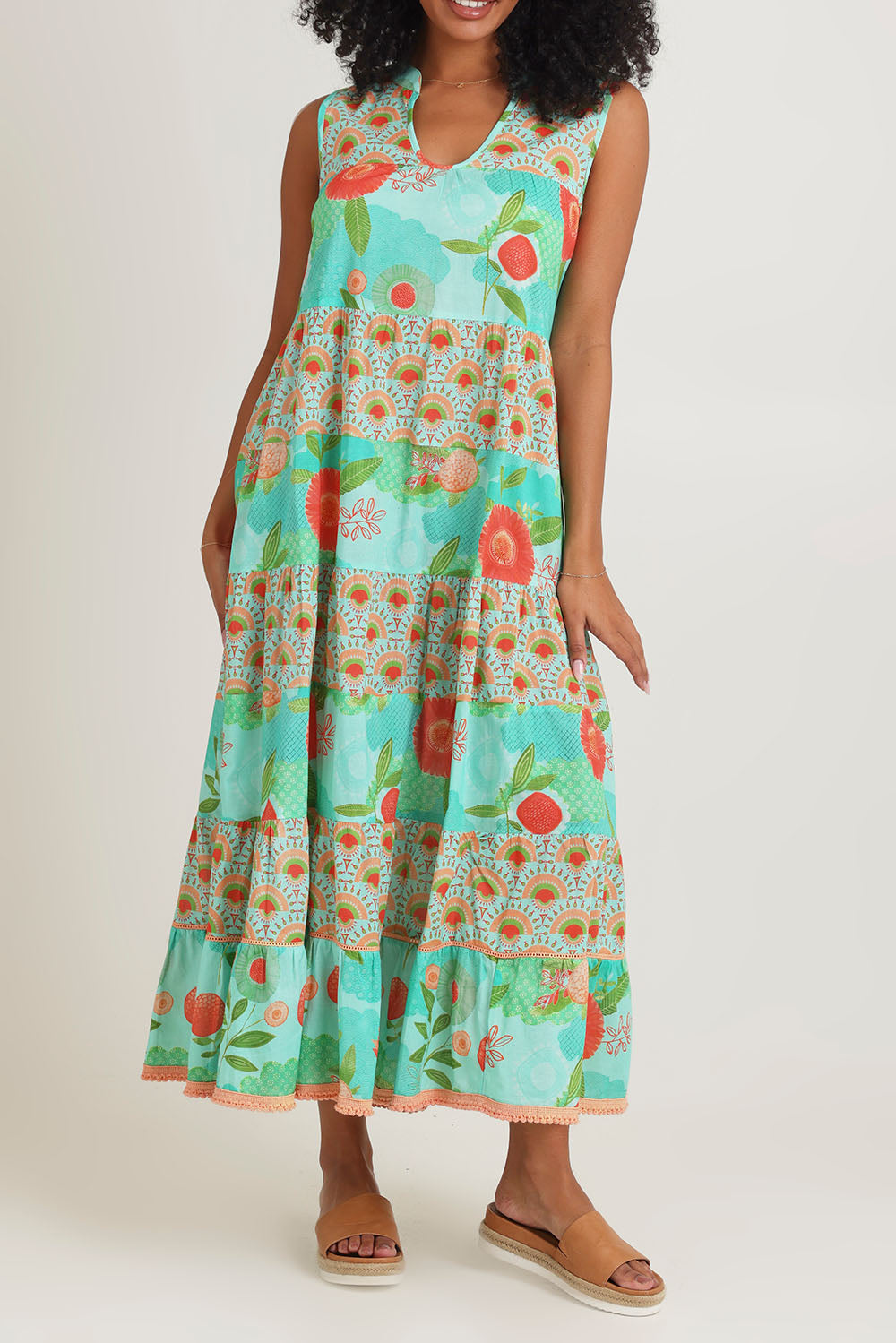 Model Ziara wearing size S of the Lulu Cotton Maxi Dress in colour Sunny (Green), from the front, cropped image