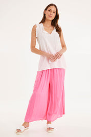 Model Madeline wearing size S of the Sophia Cami in colour White (White), from the front, showing the whole outfit