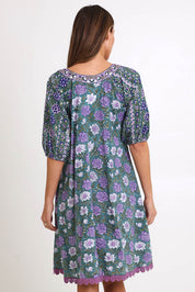 Model Madelinec wearing size 10 of the Sao Paulo Cotton Dress – Sweetpea in colour Sweetpea, from the back
