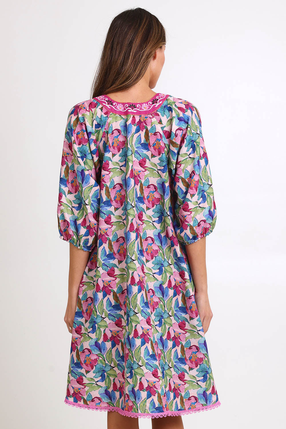 Model Madelinec wearing size 10 of the Sao Paulo Long Sleeve Dress – Forsvik in colour Forsvik, from the back