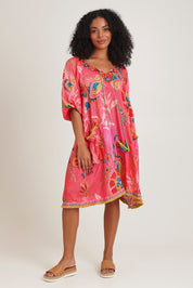 Model Ziara wearing size S of the Sao Paulo Long Sleeve Dress in colour Gloria (Pink), from the front, showing the whole outfit