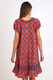 Model Madelinec wearing size 10 of the Sao Paulo Cotton Dress – Daisynavy in colour Daisynavy, from the back