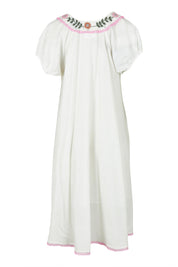 Product shot of the Sao Paulo Cotton Dress in colour Jewel (White), from the back
