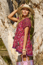 A model wearing the Sao Paulo Cotton Top in colour Oasispink (Pink), from the front, showing the whole outfit
