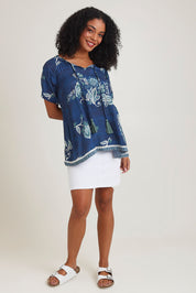 Model Ziara wearing size S of the Sao Paulo Top in colour Selene (Blue), from the front, showing the whole outfit