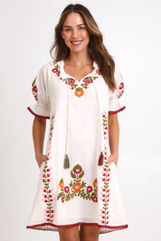 Model Madelinec wearing size 10 of the Spell Cotton Dress – Acacia in colour Acacia, in a cropped view