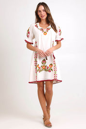 Model Madelinec wearing size 10 of the Spell Cotton Dress – Acacia in colour Acacia, from the front