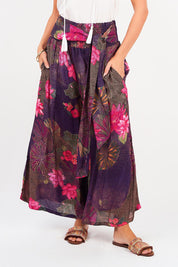 A model wearing the Hendrix Pant in colour Waterlily (Blue), from the front, cropped image