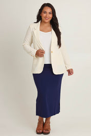 Model Ashleigh wearing size 16 of the Cotton Linen Longline Blazer in colour Cream, from the front, showing the whole outfit