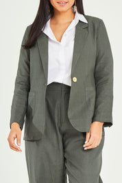 Model Terri-Leigh wearing size 14 of the Cotton Linen Longline Blazer in colour Olive (Green), from the front, cropped image