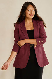 Model Tahnee wearing size 10 of the Cotton Linen Longline Blazer in colour Wine (Red), from the front, showing the whole outfit